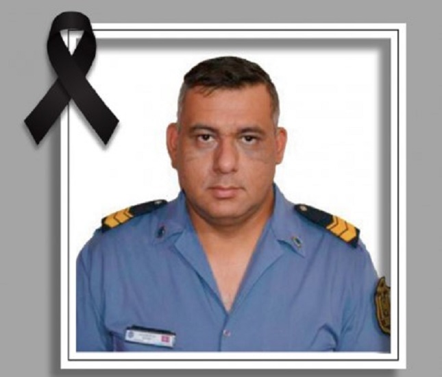policia muerto